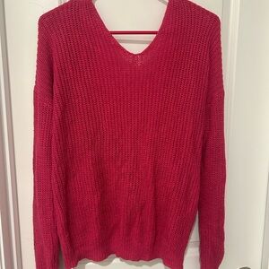 Francesca’s pink open back sweater